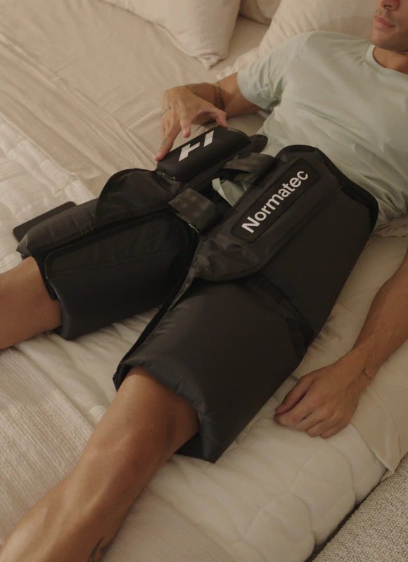 NormaTec compression therapy boots in use at Renew Wellness Place